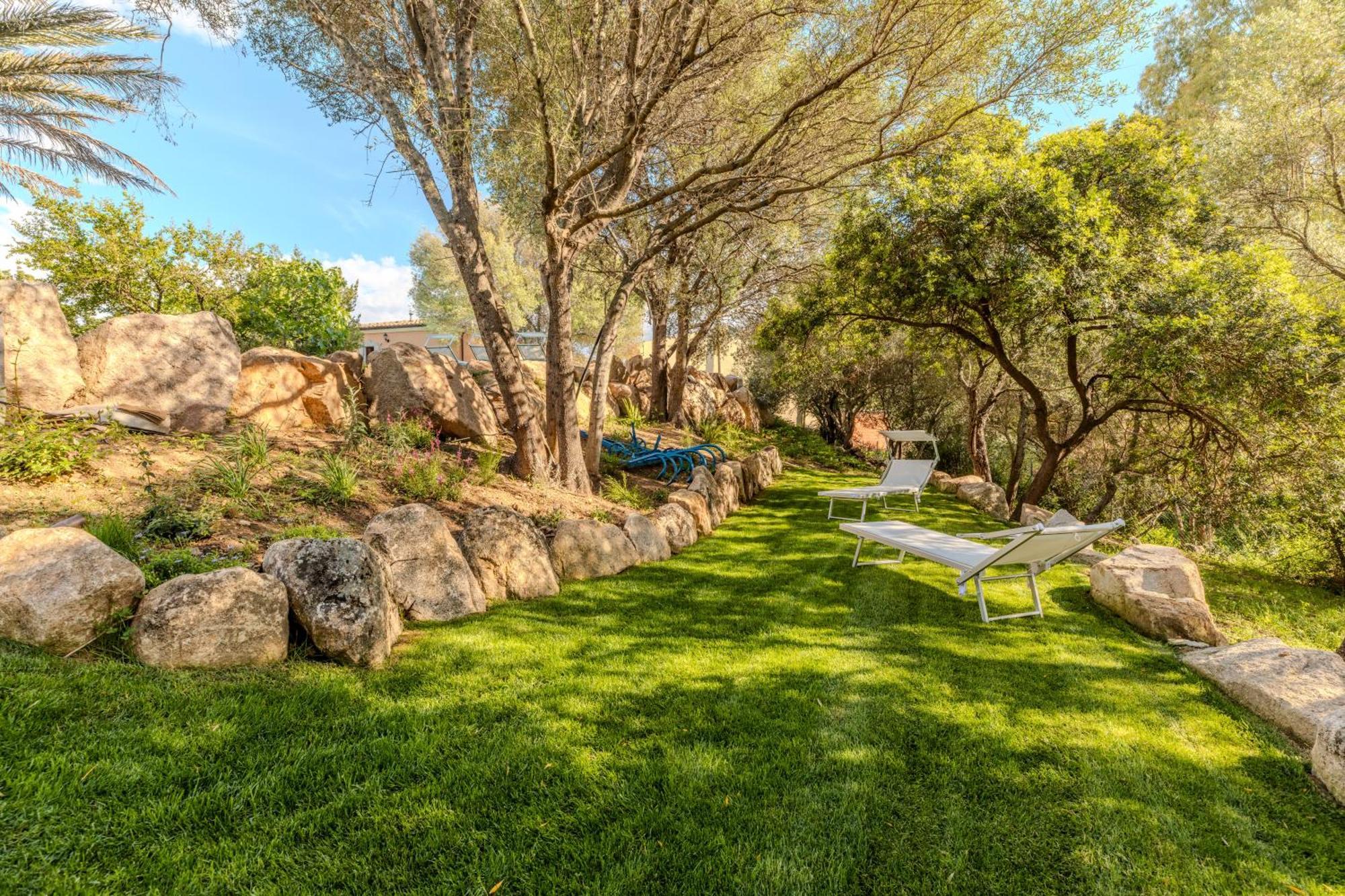Stazzo San Teodoro Piscina Condivisa Apartment Bagian luar foto