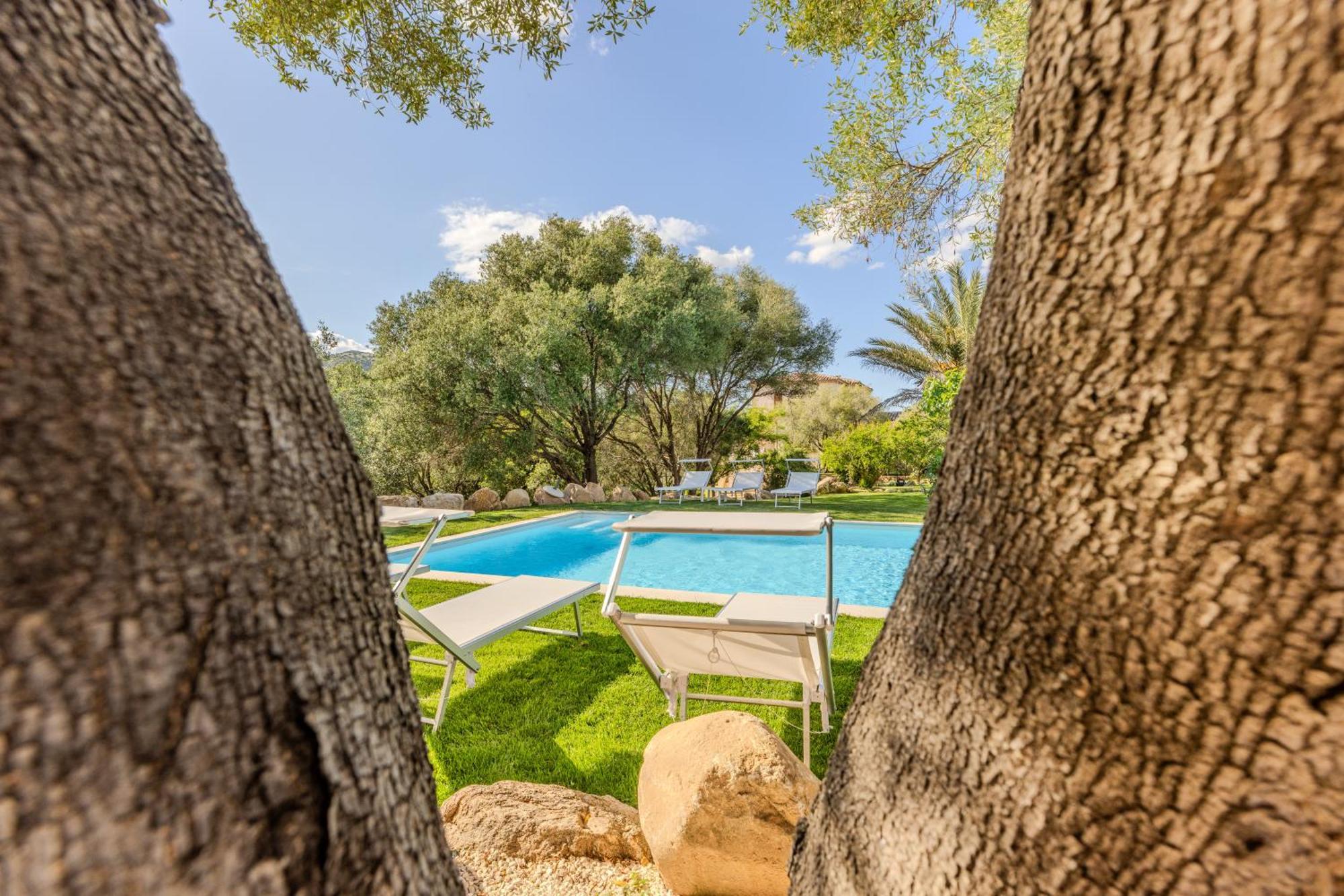 Stazzo San Teodoro Piscina Condivisa Apartment Bagian luar foto