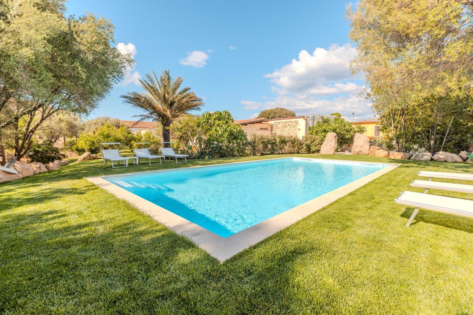 Stazzo San Teodoro Piscina Condivisa Apartment Bagian luar foto