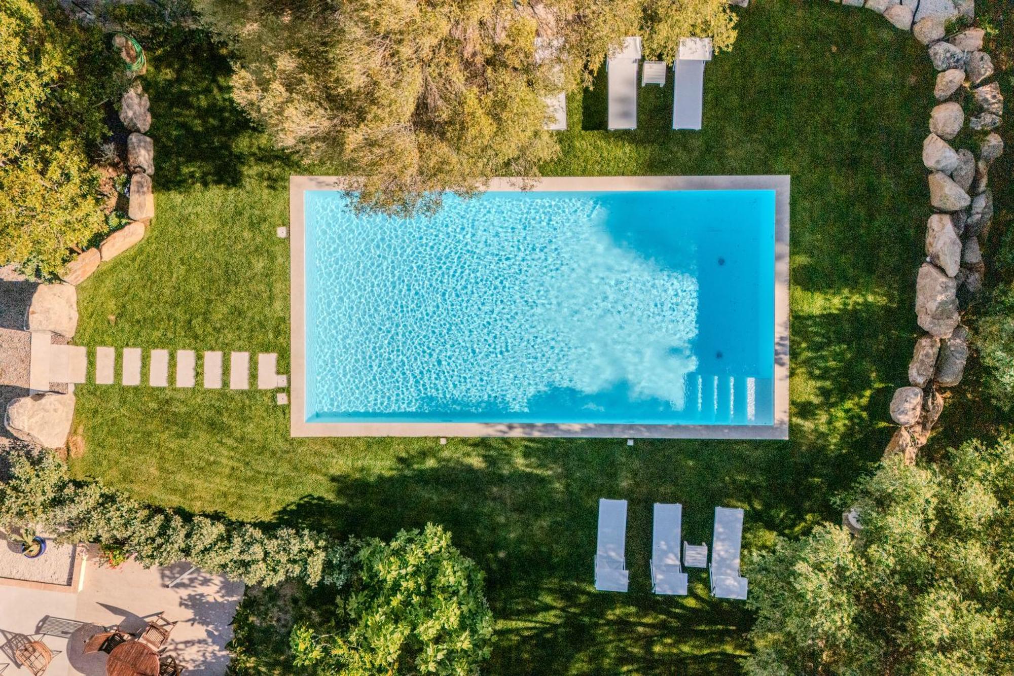 Stazzo San Teodoro Piscina Condivisa Apartment Bagian luar foto