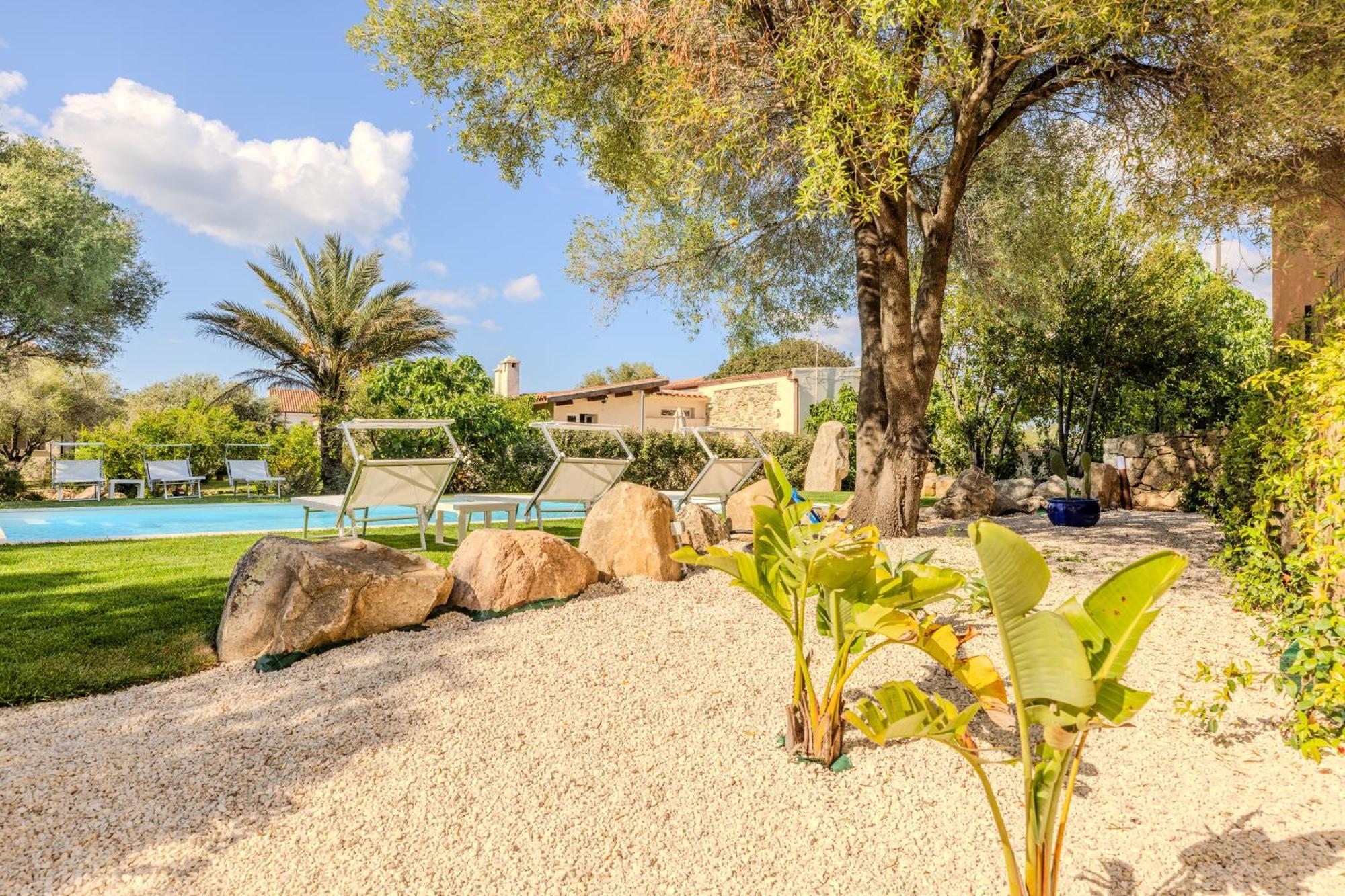 Stazzo San Teodoro Piscina Condivisa Apartment Bagian luar foto
