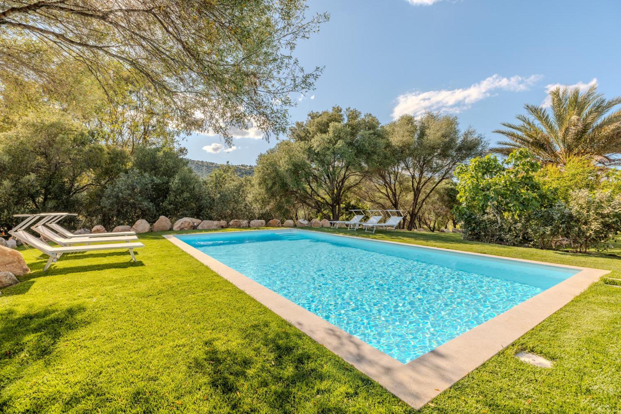 Stazzo San Teodoro Piscina Condivisa Apartment Bagian luar foto